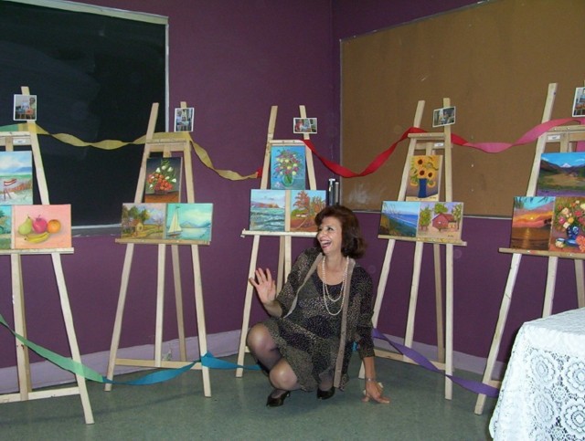 Believe it or not...this is Irene Abedrapo, posing with her students creations.